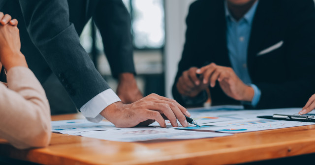 business men hands on table