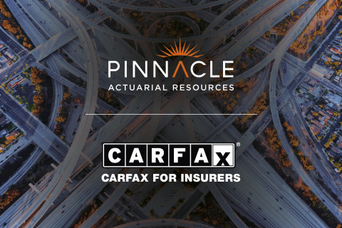 logo lock up of Pinnacle and Carfax Logos over an aerial view of a highway interchange.